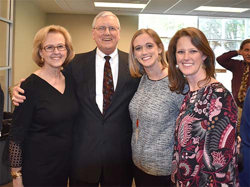 Dr. Dillon with his wife, Cathy, and daughters, Michelle and Haley.